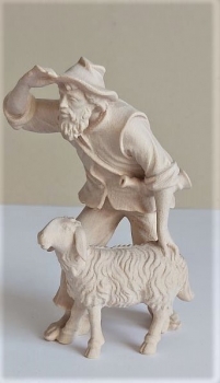 Hirte stehend mit Schaf